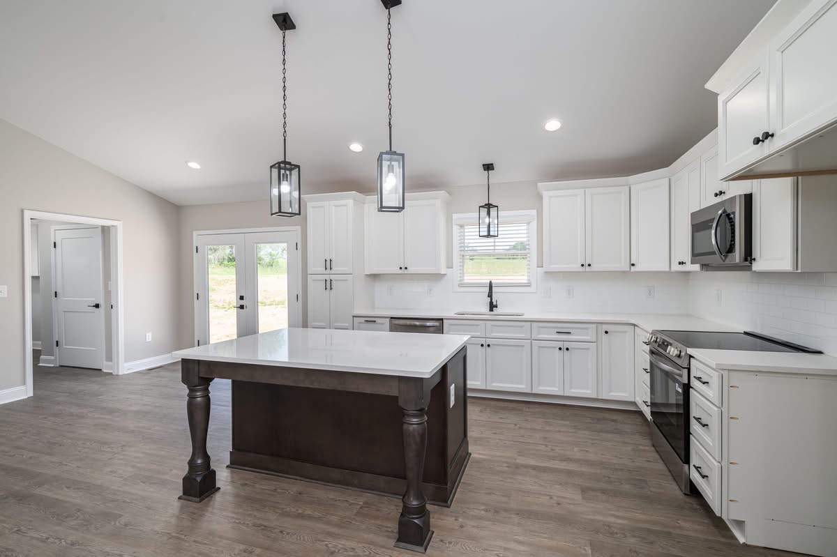 Crowder Cabinets finished white shaker kitchen with island